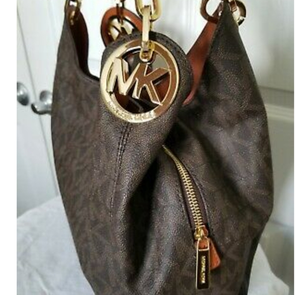 Authentic Michael Kors Fulton Brown Signature Leather. used in good condition - Picture 3 of 11